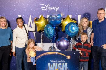 Ariana DeBose (2ndL) surprises Make-A-Wish UK families by revealing their wishes at the London Multimedia of Walt Disney Animation Studios’, 'Wish' at Odeon Leicester Square in London, on November 19, 2023 (Photo by StillMoving.Net for Disney)