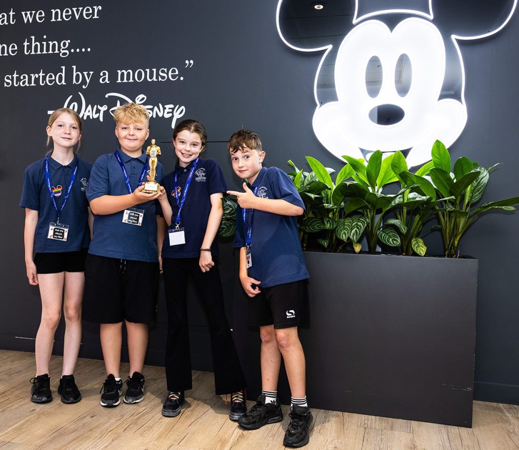 image of pupils with trophy
