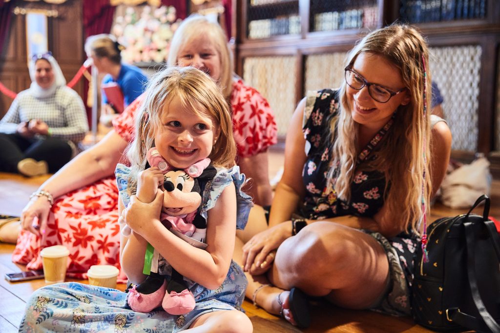 Child and adult at Make-a-Wish event