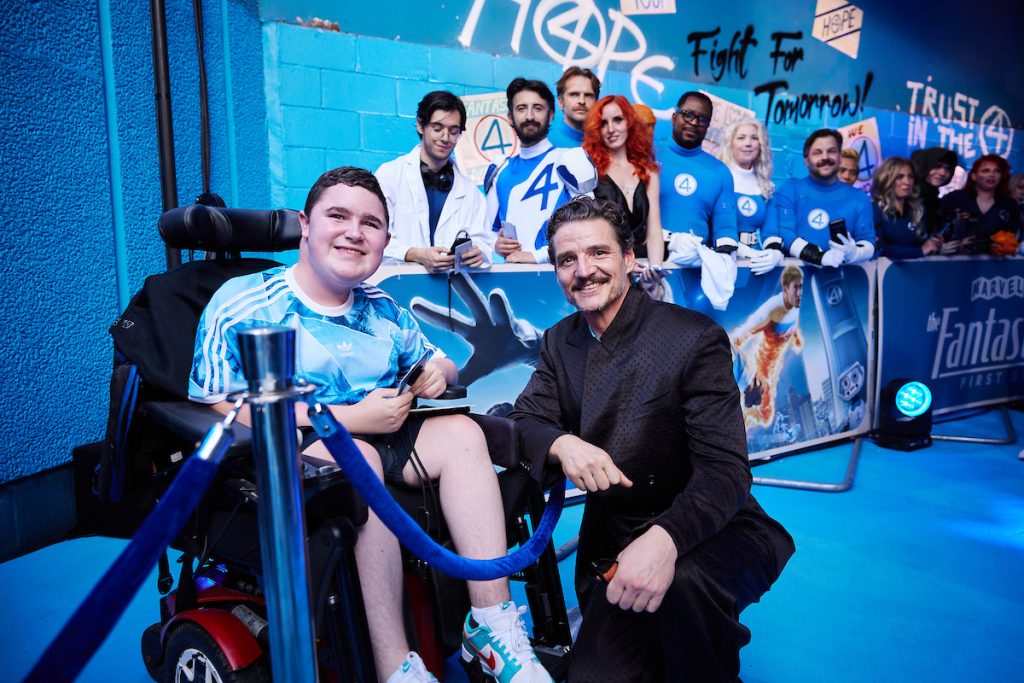 Pedro Pascal with young man in wheelchair at Fantastic Four UK Launch event